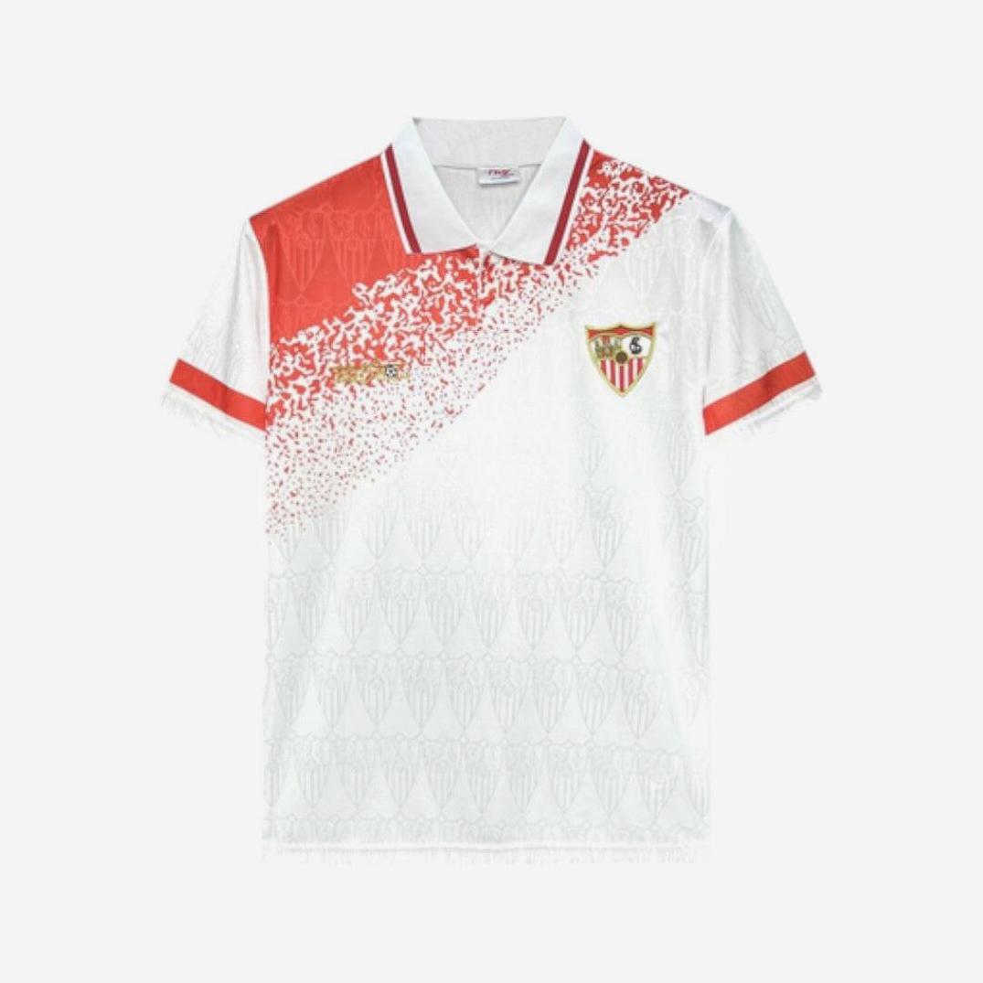 The Retro1999 Sevilla 1993-94 Home Shirt is a white jersey with a red diagonal pattern, red cuffs, and a red-and-white collar. Classic shield details and the club crest honor retro La Liga kits.